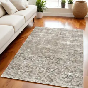 Photo of Brown and Ivory Abstract Non Skid Area Rug