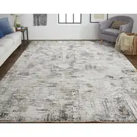 Photo of Brown and Ivory Abstract Power Loom Distressed Area Rug