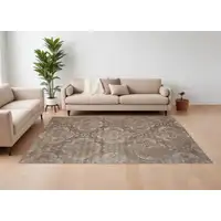 Photo of Brown and Ivory Ikat Power Loom Area Rug