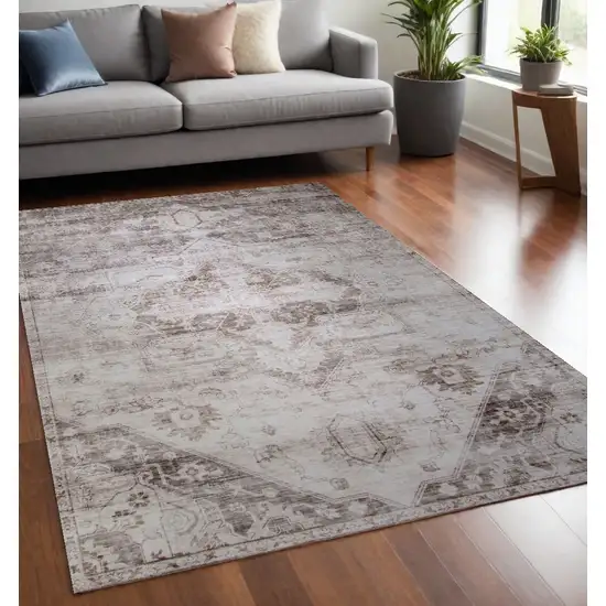 Brown and Ivory Oriental Area Rug Photo 1