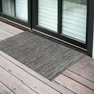 Photo of Brown and Ivory Striped Stain Resistant Indoor Outdoor Area Rug