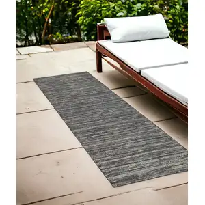 Photo of Brown and Ivory Striped Stain Resistant Indoor Outdoor Runner Rug