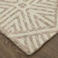 Photo of Brown and Ivory Wool Geometric Hand Tufted Area Rug