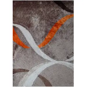 Photo of Brown and Orange Shag Hand Tufted Area Rug