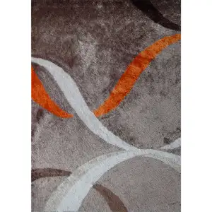 Photo of Brown and Orange Shag Hand Tufted Area Rug