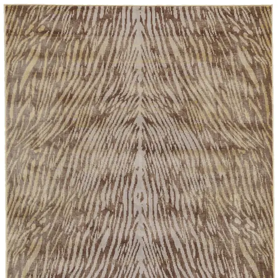 Brown and Tan Animal Print Power Loom Area Rug Photo 3