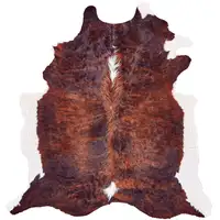 Photo of Brown and White Cowhide Animal Print Power Loom Area Rug