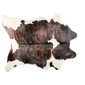 Photo of Brown and White Cowhide Hand Knotted Area Rug