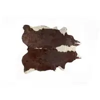 Photo of Brown and White Cowhide Handmade Area Rug