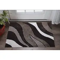 Photo of Brown and White Shag Hand Tufted Area Rug