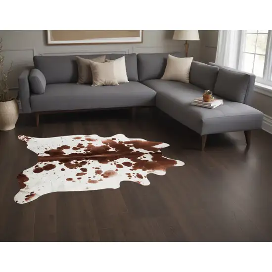 Brown And White Spotted Natural Cowhide Area Rug Photo 1