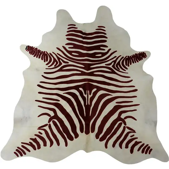 Brown and White Stenciled Cowhide Rug Photo 1