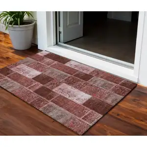 Photo of Burgundy Merlot And Blush Patchwork Washable Indoor Outdoor Area Rug