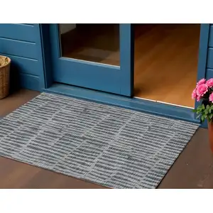 Photo of Charcoal And Gray Striped Washable Indoor Outdoor Area Rug