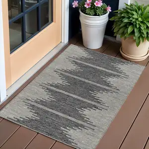 Photo of Charcoal And Ivory Abstract Washable Indoor Outdoor Area Rug