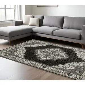 Photo of Charcoal And Ivory Medallion Area Rug With Fringe