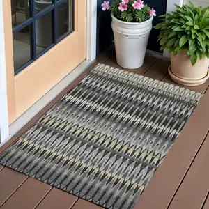 Photo of Charcoal Gray And Beige Southwestern Washable Indoor Outdoor Area Rug