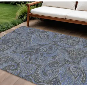 Photo of Charcoal Gray And Blue Paisley Washable Indoor Outdoor Area Rug