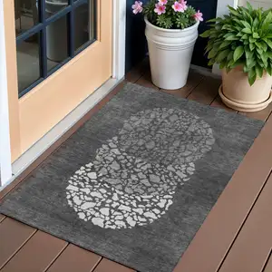 Photo of Charcoal Gray And Silver Abstract Washable Indoor Outdoor Area Rug