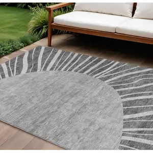 Photo of Charcoal Gray And Silver Abstract Washable Indoor Outdoor Area Rug