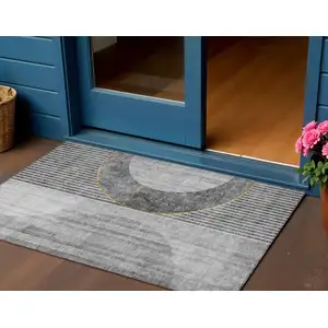 Photo of Charcoal Gray And Silver Geometric Washable Indoor Outdoor Area Rug