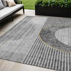 Photo of Charcoal Gray And Silver Geometric Washable Indoor Outdoor Area Rug