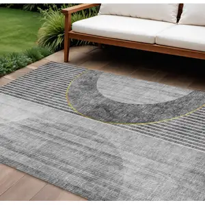 Photo of Charcoal Gray And Silver Geometric Washable Indoor Outdoor Area Rug