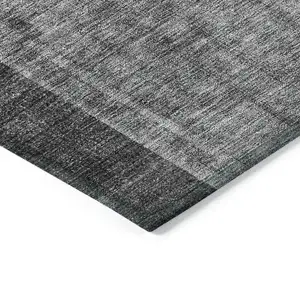 Photo of Charcoal Gray And Silver Geometric Washable Indoor Outdoor Area Rug