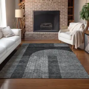 Photo of Charcoal Gray And Silver Geometric Washable Indoor Outdoor Area Rug