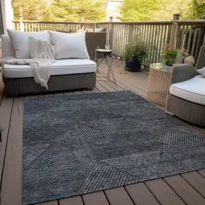 Photo of Charcoal Gray And Silver Geometric Washable Indoor Outdoor Area Rug