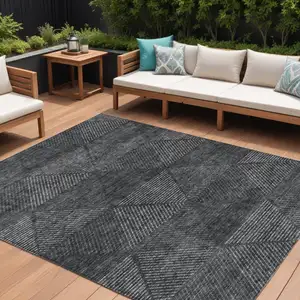 Photo of Charcoal Gray And Silver Geometric Washable Indoor Outdoor Area Rug