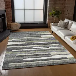 Photo of Charcoal Gray And Silver Striped Washable Indoor Outdoor Area Rug