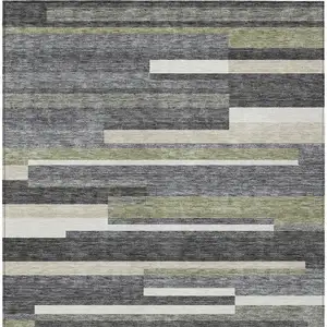 Photo of Charcoal Gray And Silver Striped Washable Indoor Outdoor Area Rug