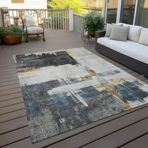 Photo of Charcoal Gray And Tan Abstract Washable Indoor Outdoor Area Rug