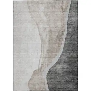 Photo of Charcoal Gray And Taupe Abstract Washable Indoor Outdoor Area Rug