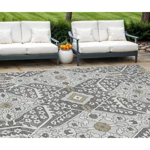 Photo of Charcoal Gray And Taupe Floral Washable Indoor Outdoor Area Rug