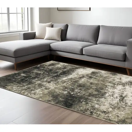 Gray and Ivory Abstract Power Loom Area Rug Photo 1