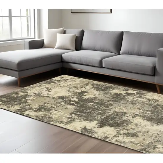 Gray and Ivory Abstract Power Loom Area Rug Photo 1