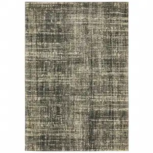 Photo of Charcoal Grey Beige And Tan Abstract Power Loom Stain Resistant Area Rug