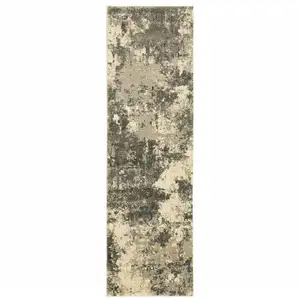 Photo of Charcoal Grey Beige And Tan Abstract Power Loom Stain Resistant Runner Rug