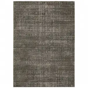 Photo of Charcoal Grey Grey Ivory Tan And Brown Abstract Power Loom Stain Resistant Area Rug