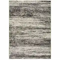 Photo of Charcoal Grey Silver And Ivory Abstract Power Loom Stain Resistant Area Rug