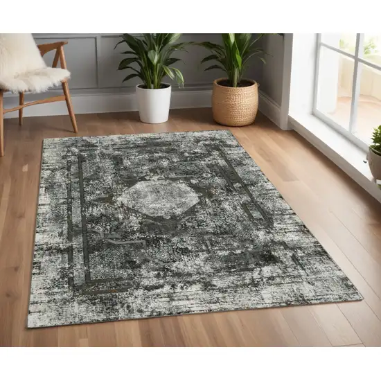 Gray and Ivory Oriental Power Loom Area Rug Photo 1