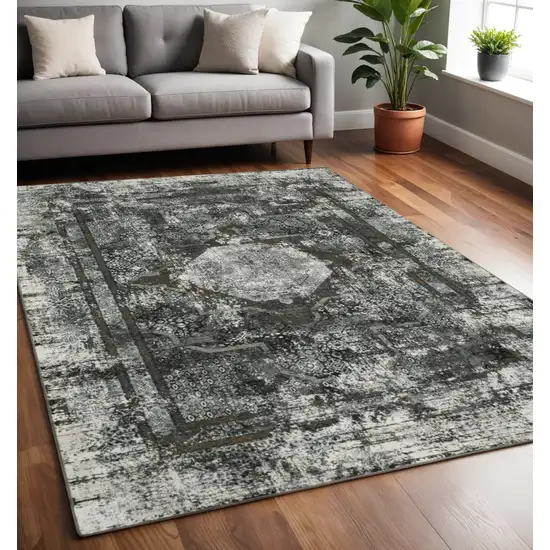 Gray and Ivory Oriental Power Loom Area Rug Photo 1