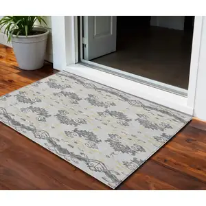 Photo of Charcoal Silver And Gold Oriental Washable Indoor Outdoor Area Rug