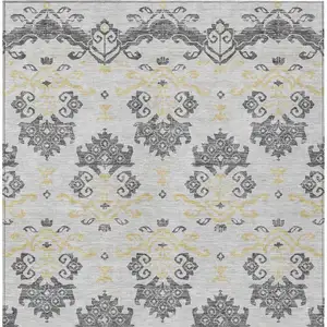 Photo of Charcoal Silver And Gold Oriental Washable Indoor Outdoor Area Rug