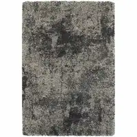 Photo of Charcoal Silver And Grey Abstract Shag Power Loom Stain Resistant Area Rug