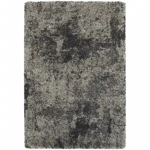 Photo of Charcoal Silver And Grey Abstract Shag Power Loom Stain Resistant Area Rug