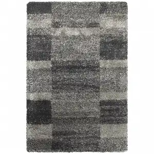 Photo of Charcoal Silver And Grey Geometric Shag Power Loom Stain Resistant Area Rug