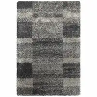 Photo of Charcoal Silver And Grey Geometric Shag Power Loom Stain Resistant Area Rug